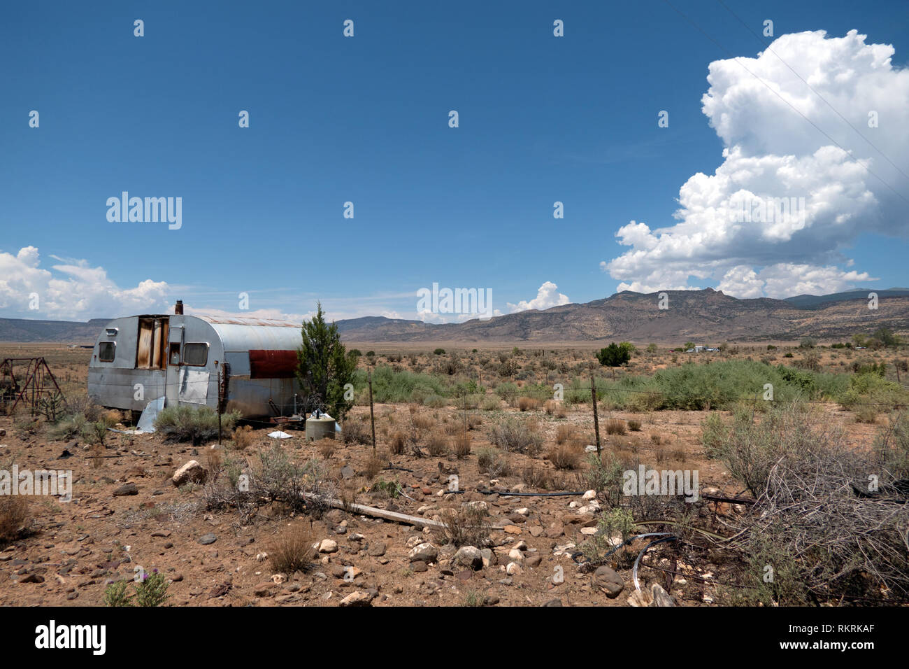 Abandoned trailer in the desert near San Fidel, New Mexico, United States of America. View of a small American village in the Southwest USA. Summer la Stock Photo