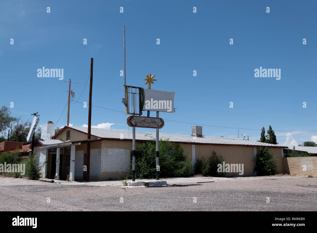 Abandoned restaurant in San Fidel, New Mexico, United States of America View of a small American town in the Southwest USA. Derelict and closed old bu Stock Photo