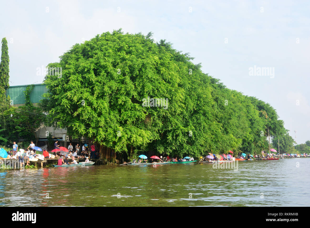 BANGKOK, THAILAND â€“ OCTOBER 8, 2017 : Tuk baat Phra Roi River Festival (Give alms to a Buddhist monk on boat) On the Lamplatiew Canal in front of Wa Stock Photo