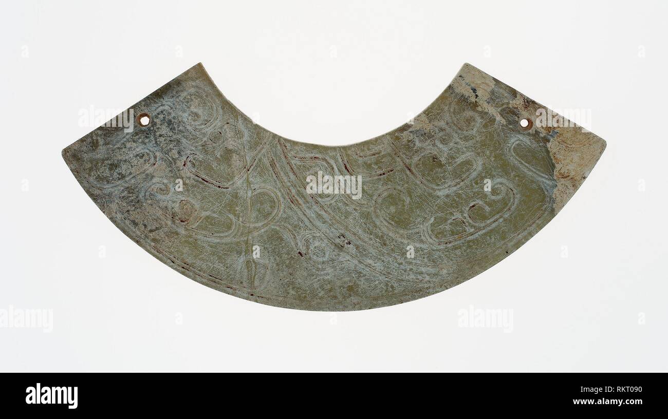 Arc-shaped pendant (huang) - Western Zhou period, c. 10th century B.C. - China - Origin: China, Date: 1000 BC–900 BC, Medium: Jade, Dimensions: Diam. Stock Photo