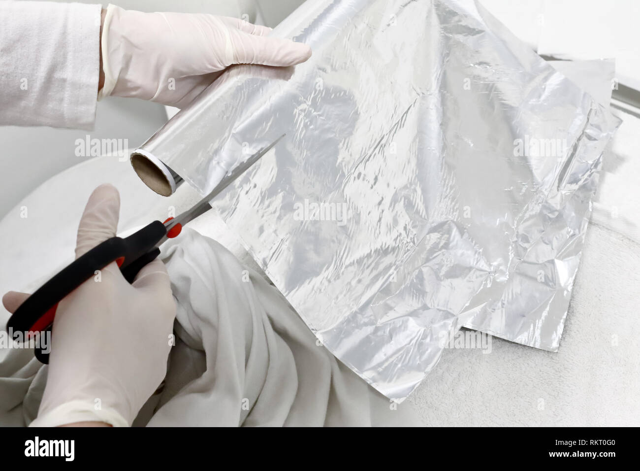 Aluminum foil cutter hires stock photography and images Alamy
