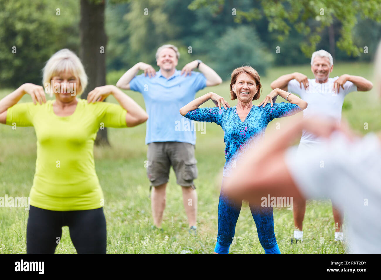 seniors doing gymnastics in the park Stock Photo - Alamy