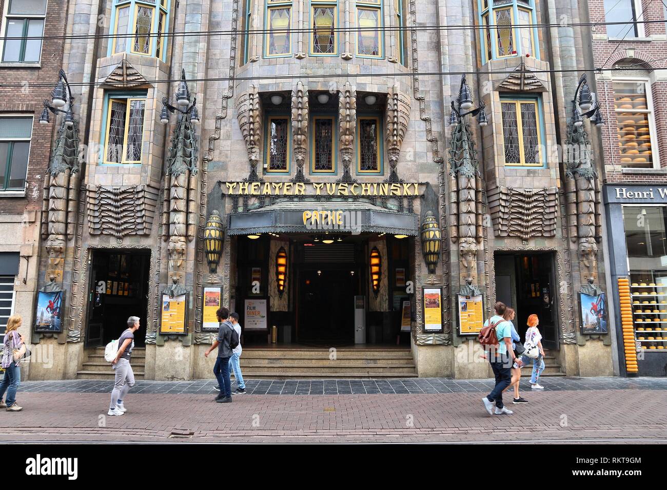 AMSTERDAM, NETHERLANDS JULY 10, 2017 People walk by movie theater