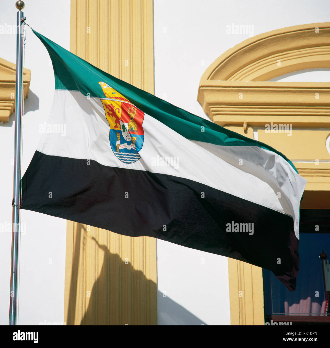 Flag of Extremadura. Government building of the Autonomous Community of Extremadura ('Assembly of Extremadura'). Merida, Extremadura, province of Badajoz, Spain. Stock Photo