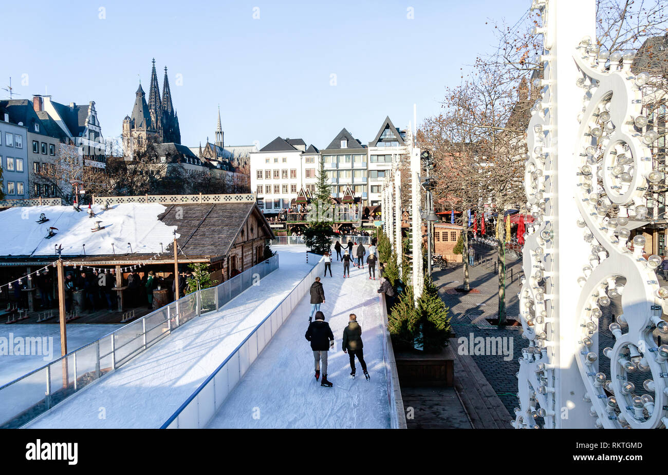 Cologne, Germany - wintertime in the Old Town. In this fairy-tale atmosphere, a unique skating rink fits into the Heumarkt (Hay Market). Stock Photo