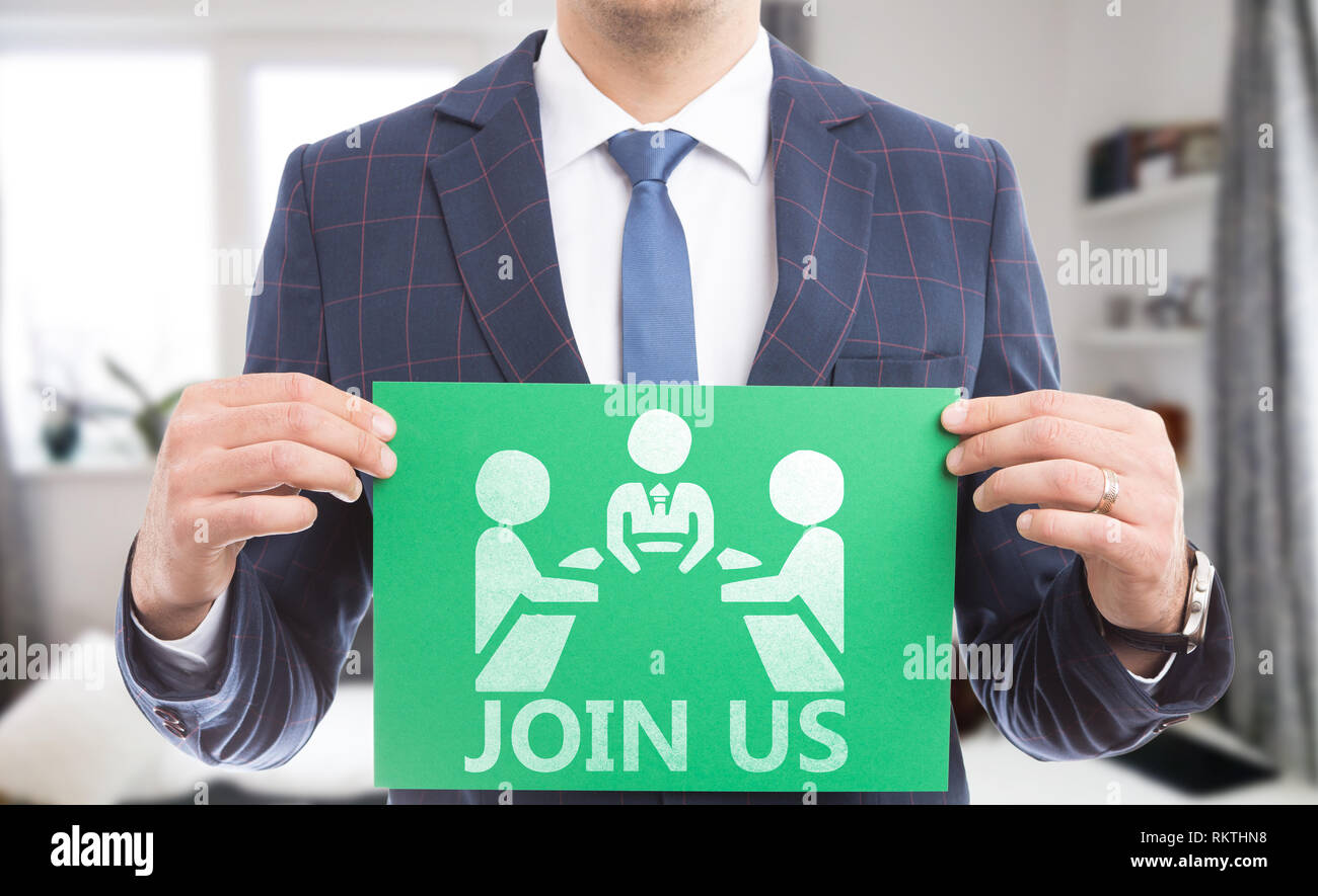 Man Presenting Green Paper With Join Us Text And People At Round Table Meeting Symbol As Business Hiring Concept Stock Photo Alamy