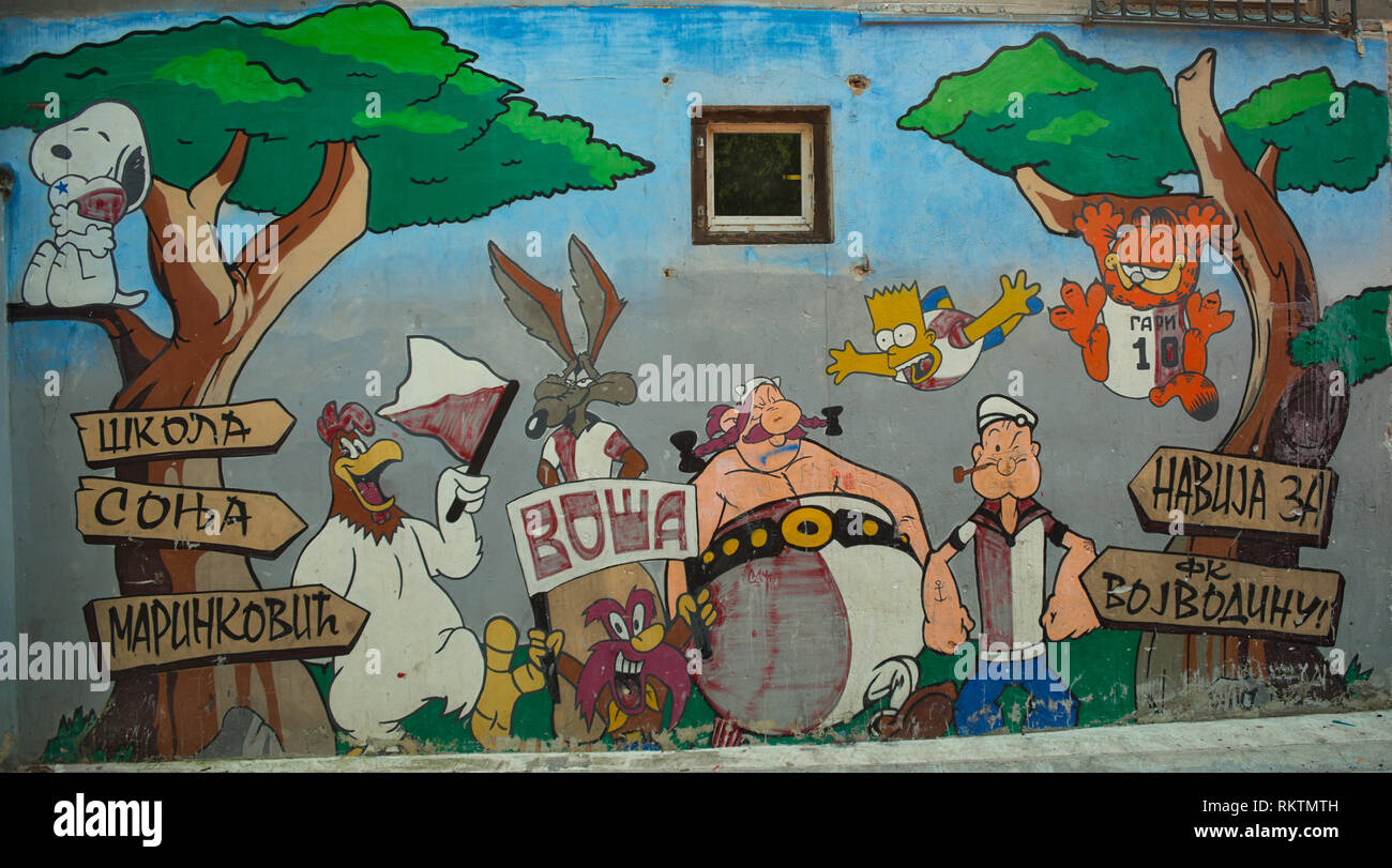 NOVI SAD, SERBIA - August 21st 2018- graffiti on wall in school with various cartoon characters Stock Photo