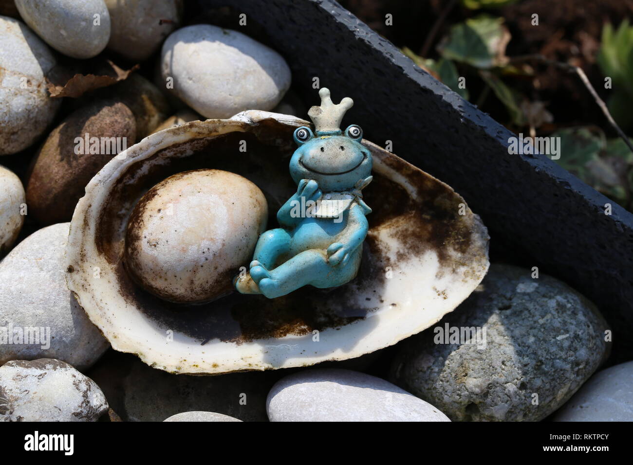 Princess Frog / Decoration at the garden pond Stock Photo