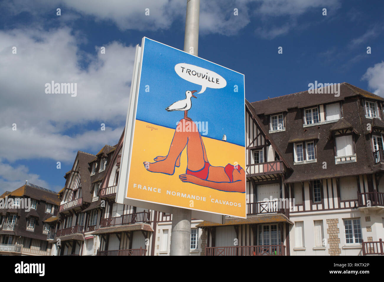 A holiday poster on the seafront at Trouville-sur-Mer, Normandy, France. Stock Photo