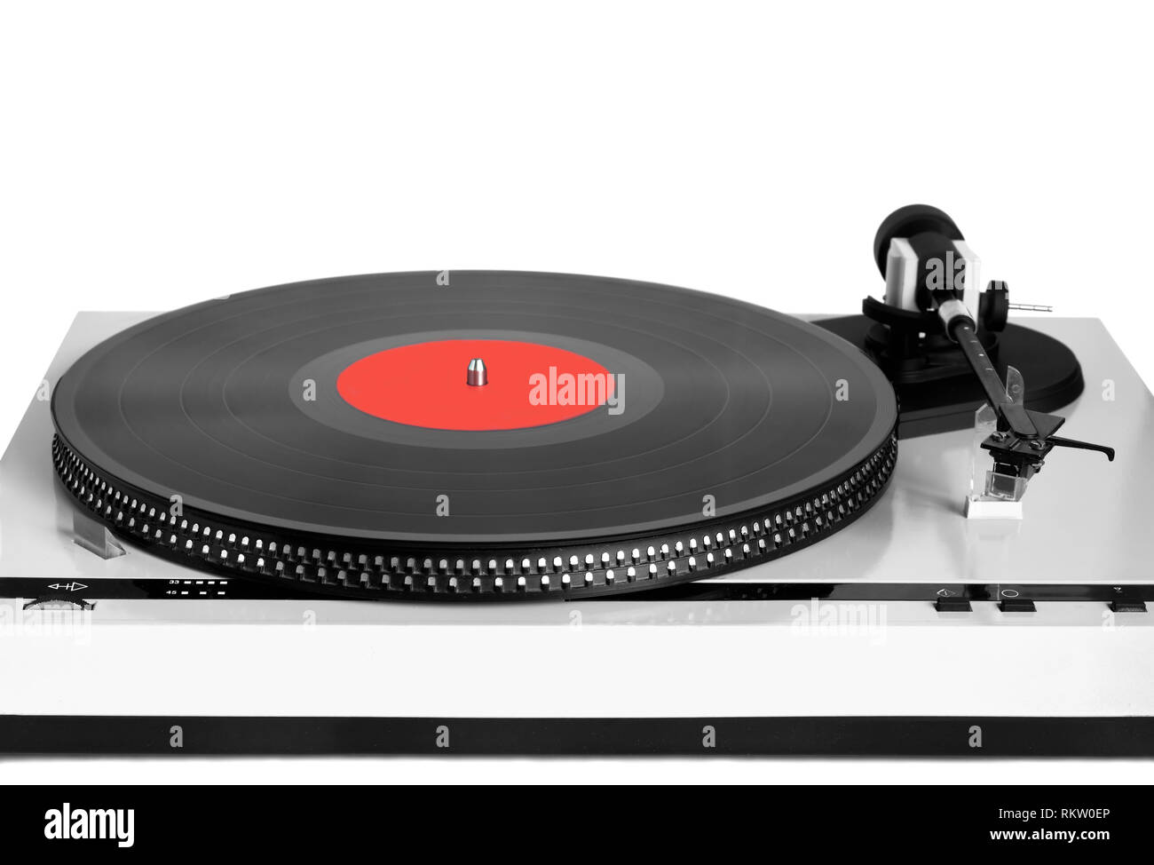 Turntable in gray case with black vinyl record with red label on disc with stroboscope marks isolated on white background. Horizontal black and white Stock Photo