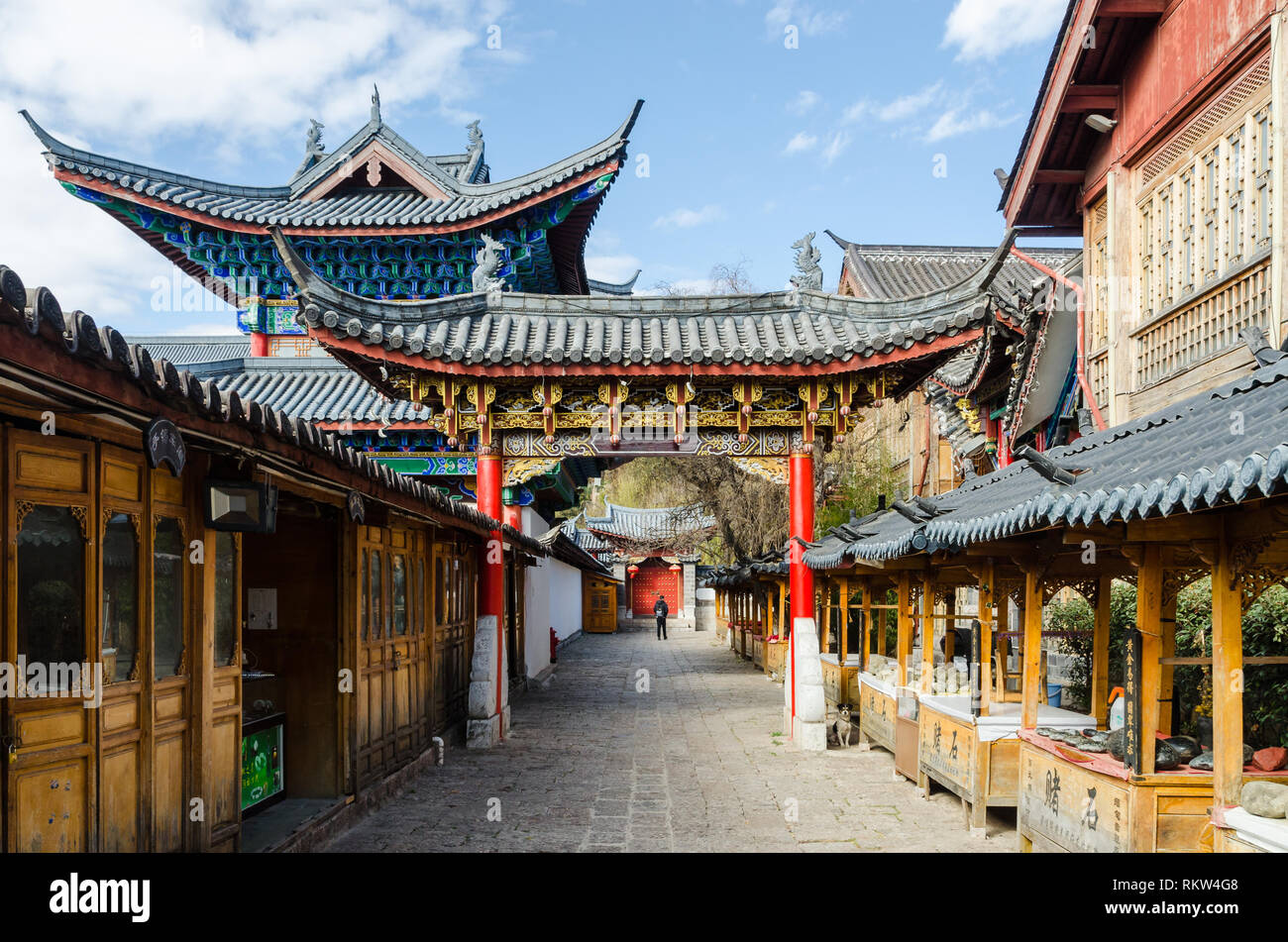 Ornate colorful gate built in traditional Chine style, Lijiang old town, Yunnan, China Stock Photo