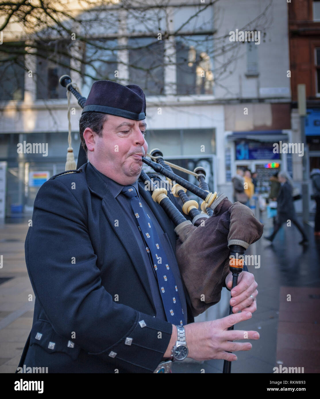 A lone piper busking in Leicester city centre. Stock Photo