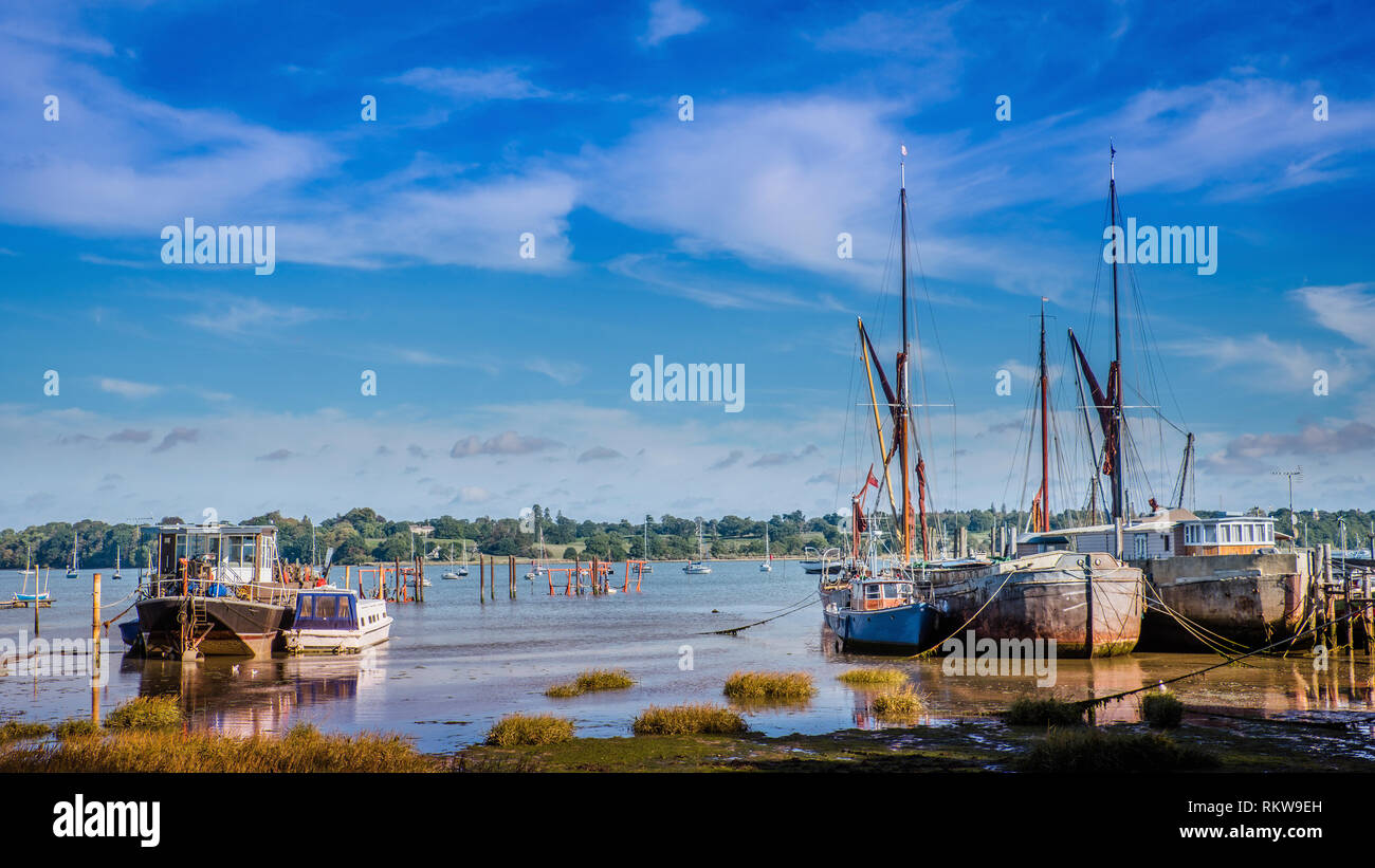 Boats of all kinds can be seen at Pin Mill. Stock Photo