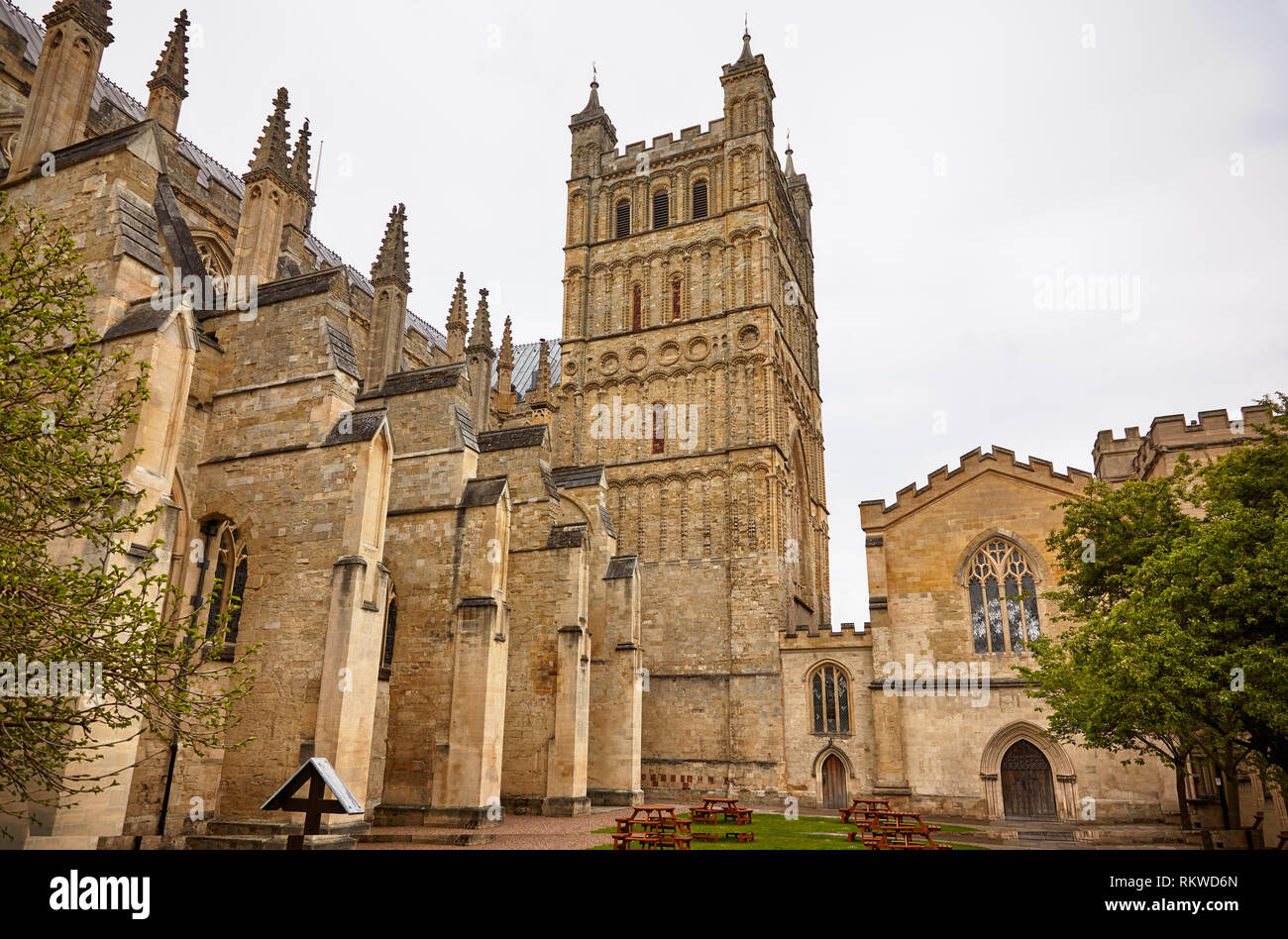 The south tower and wall of Exeter Cathedral reinforced by the flying buttresses. Exeter. Devon. England Stock Photo