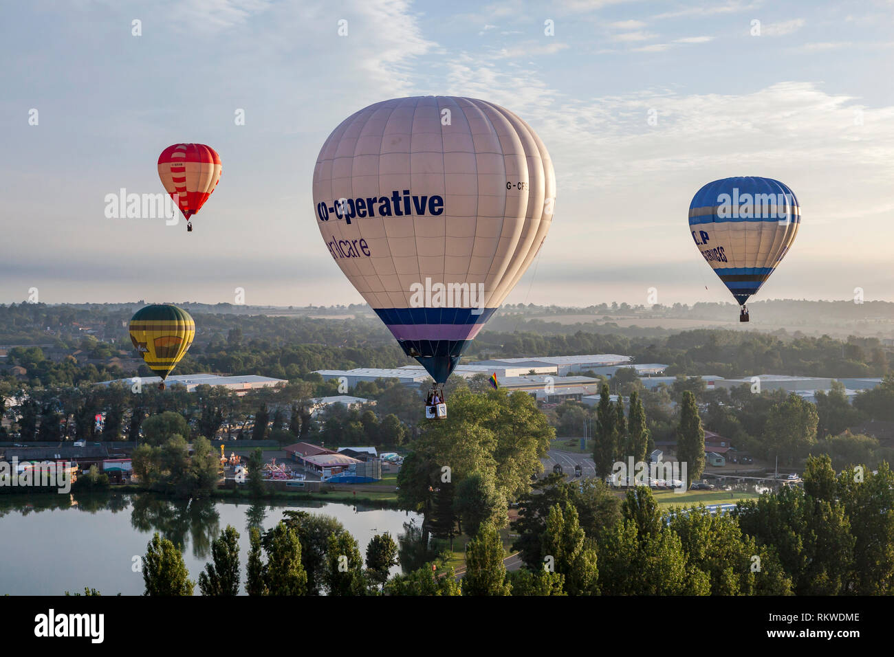 Balloons floating above spectators at the Northampton Balloon Festival