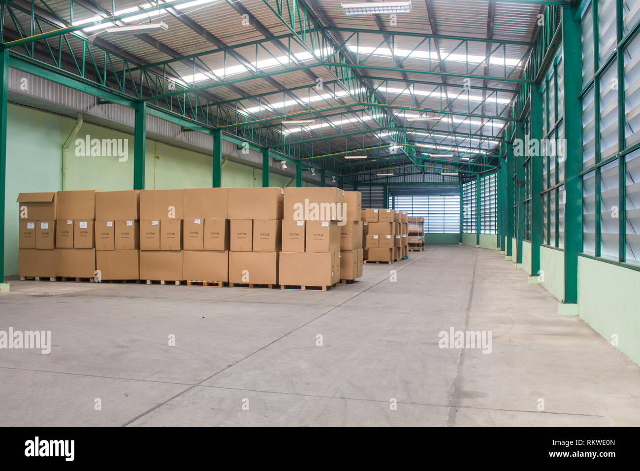 warehouse. Rows of shelves with boxes Stock Photo - Alamy