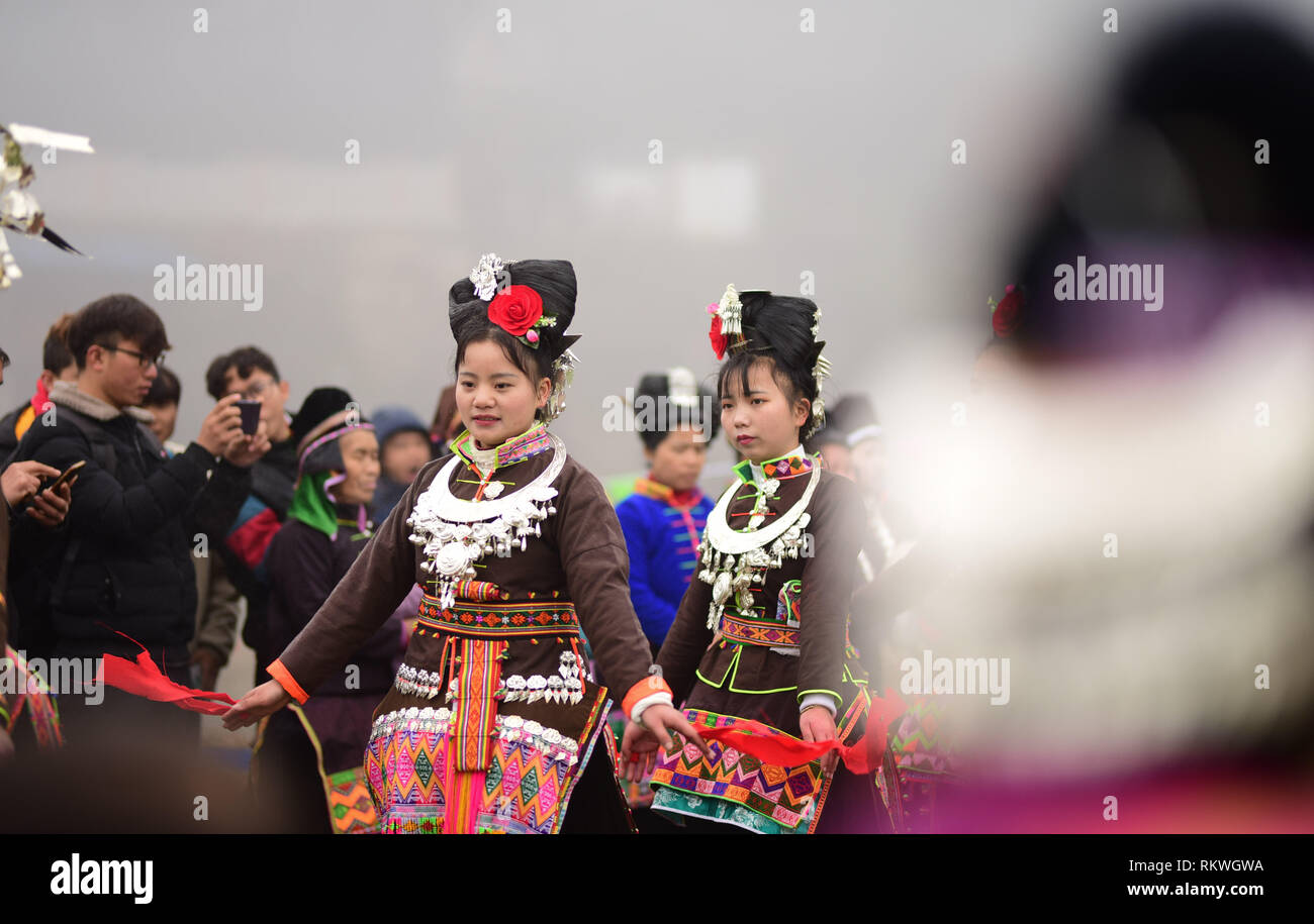 A Chinese villager of Miao ethnic group wearing traditional costumes  practises ''Miao stickfighting'', a unique martial art of the Miao Martial  Arts i Stock Photo - Alamy