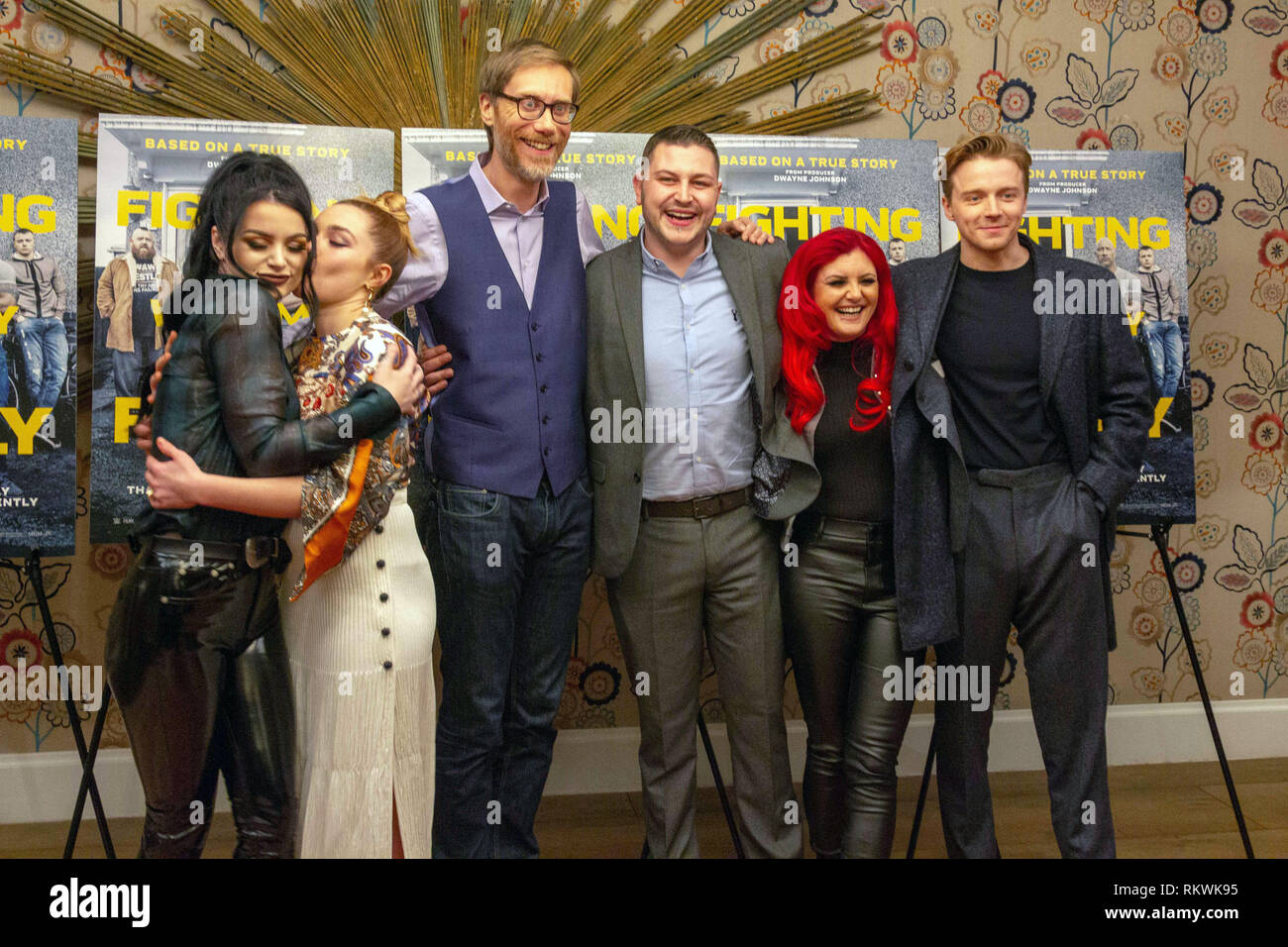 New York, NY, USA. 11th Feb. 2019. (L-R) WWE star Paige, actress, Florence Pugh, writer and director Stephen Merchant, Zak Bevis aka Zack Zodiac, Julia “Sweet Saraya” Hamer-Bevis, and actor Jack Lowden attend the New York Tastemaker screening of “Fighting with My Family” at the Crosby Street Hotel in New York City on February 11, 2019. Credit: Jeremy Burke/Alamy Live News Stock Photo