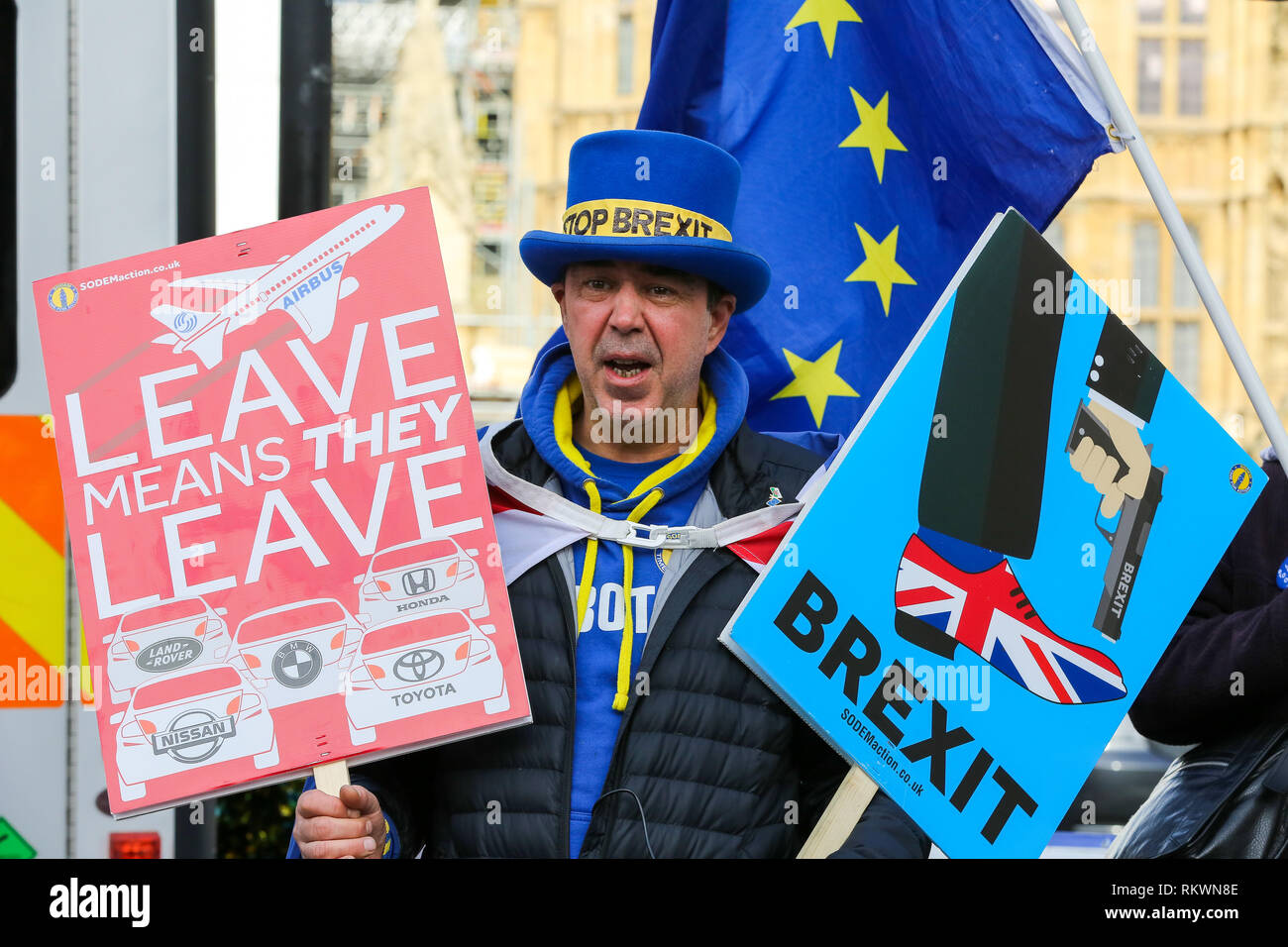 London, UK. 12th Feb, 2019. Steven Bray founder of SODEM (Stand of Defiance European Movement) seen with placards during an anti-Brexit protest outside Downing Street in London. Credit: SOPA Images/ZUMA Wire/Alamy Live News Stock Photo