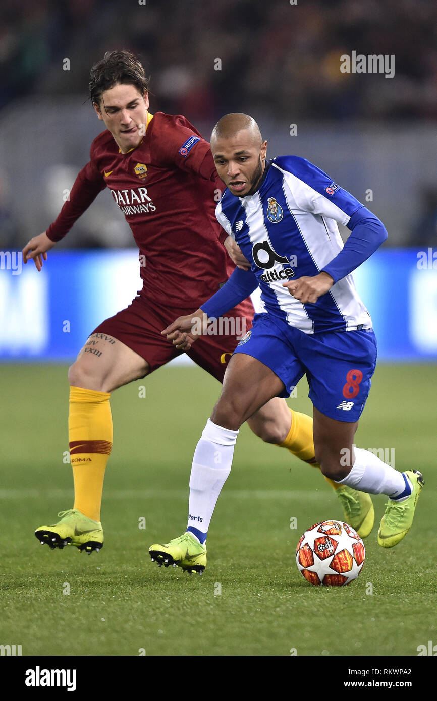 Rome, Italy. 12th Feb, 2019. Nicol˜ Zaniolo of AS Roma and Yacine Brahimi of Porto fight for the ball during the UEFA Champions League round of 16 match between AS Roma and FC Porto at Stadio Olimpico, Rome, Italy on 12 February 2019. Photo by Giuseppe Maffia. Credit: UK Sports Pics Ltd/Alamy Live News Stock Photo