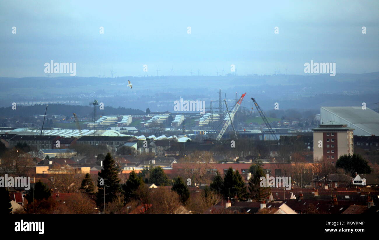 Glasgow, Scotland, UK  12th, February, 2019 UK Weather: Sunny day over the west end of the city saw the Clyde shipyards and intu at Braehead south of the river in the sunshine as the residential area saw a crisp day as if summer had arrived. Credit Gerard Ferry/Alamy Live News Stock Photo