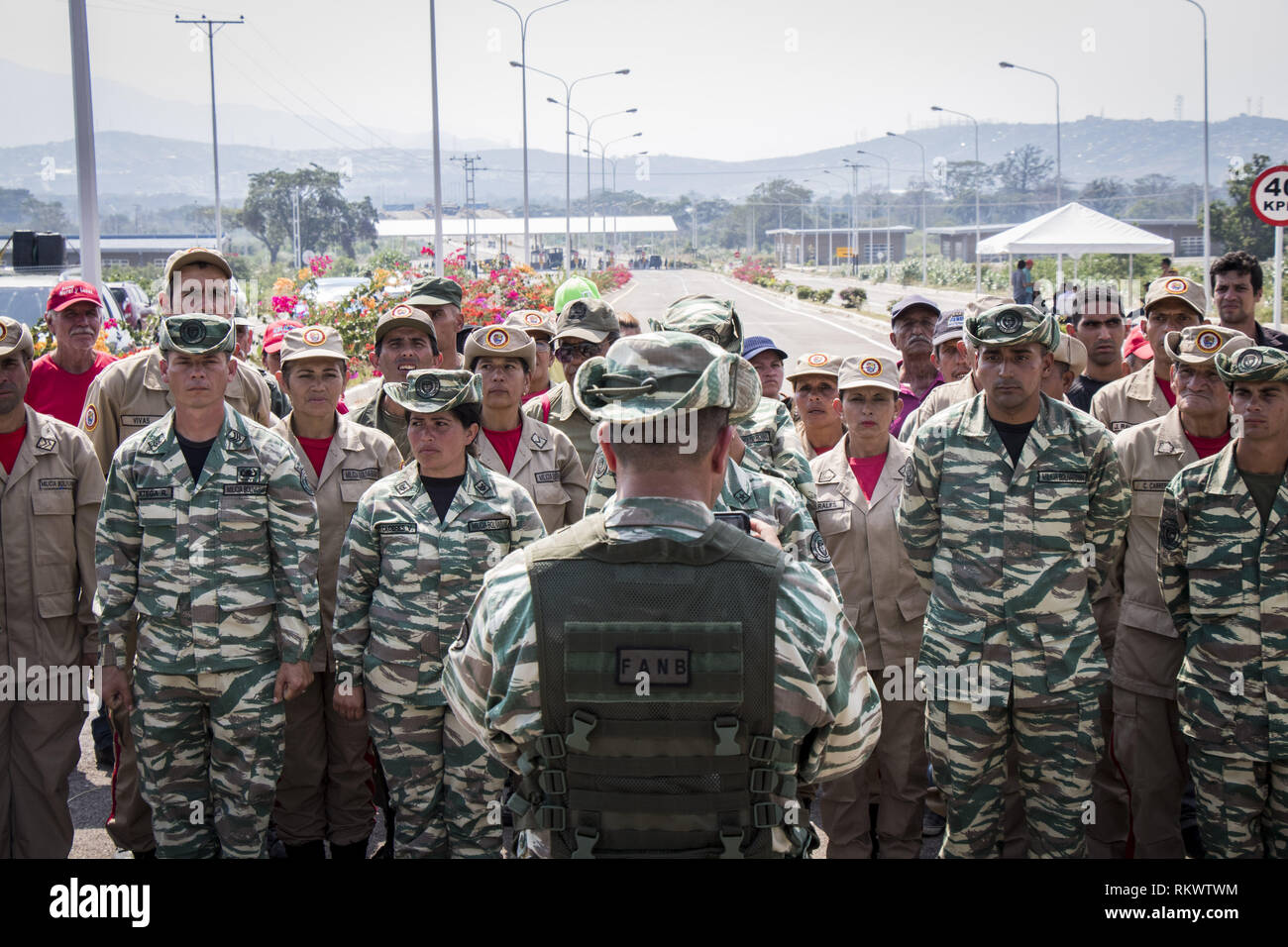 Caracas, Venezuela. 12th Feb, 2019. members of Venezuela's Bolivarian National Guard patrols at Tienditas international bridge in Urena, Tachira state, Venezuela, in the border with Colombia, backdropped by containers placed by Venezuelan military forces to block the bridge, on February 12, 2019. Credit: Elyxandro Cegarra/ZUMA Wire/Alamy Live News Stock Photo