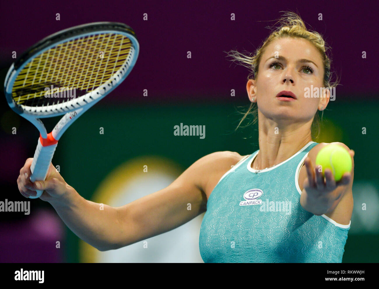 Doha, Qatar. 12th Feb, 2019. Camila Giorgi of Italy serves during the  women's singles first round match between Kiki Bertens of the Netherlands  and Camila Giorgi of Italy at the 2019 WTA