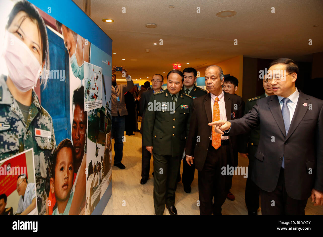 (190213) -- BEIJING, Feb. 13, 2019 (Xinhua) -- (R-L) China's Permanent Representative to the United Nations Ma Zhaoxu, UN Under-Secretary General for Field Support Atul Khare and head of the Chinese People's Liberation Army (PLA) delegation for international communication Mao Naiguo visit an exhibition on China's peacekeeping input at the UN headquarters in New York Feb. 11, 2019. With the theme "CPLA: A Force for World Peace," the exhibition displayed four sections of pictures, featuring Chinese military's participation in UN peacekeeping missions, securing maritime passages, disaster relief Stock Photo