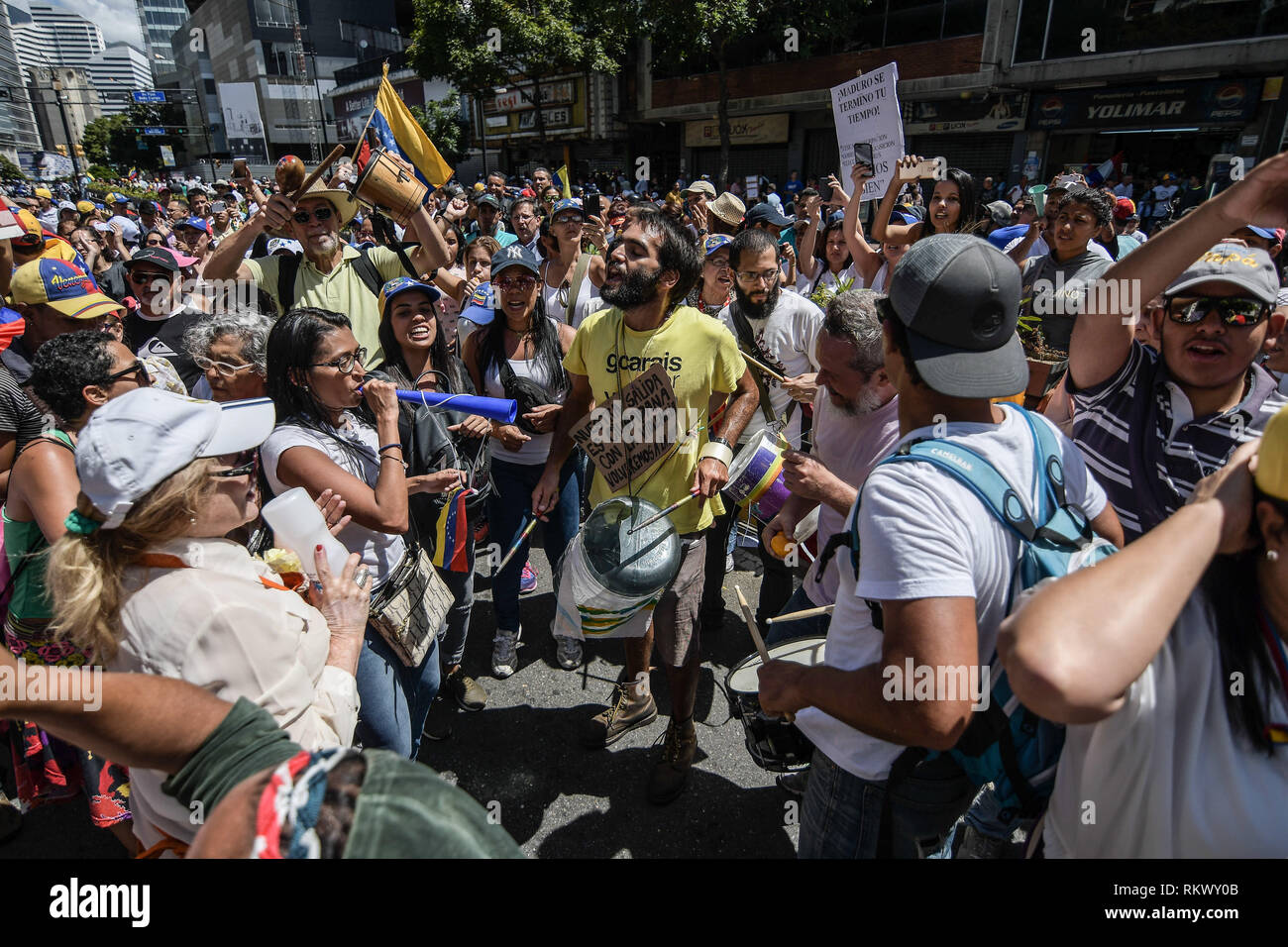 Caracas, Miranda, Venezuela. 12th Feb, 2019. Musicians seen performing during a protest to call for a change in the government.Opponents gather at a protest organised by the PSUV (United Socialist Party of Venezuela) after the call from interim president Juan Guaido, to show their support to him, while asking the army to allow more humanitarian aids into the country. Credit: Roman Camacho/SOPA Images/ZUMA Wire/Alamy Live News Stock Photo