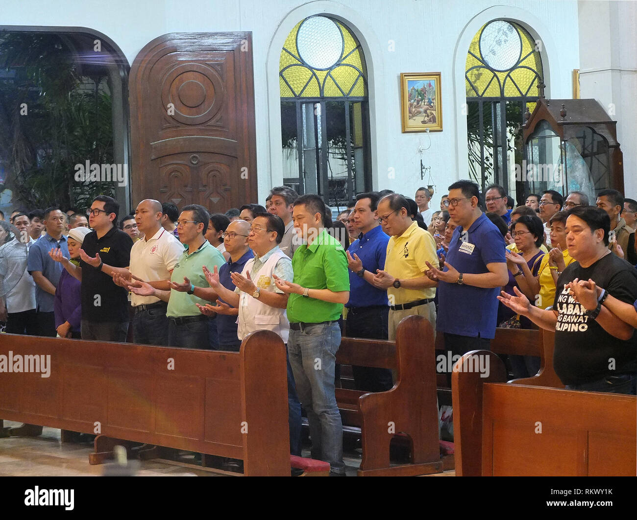 The eight Senatorial candidates with former President Benigno 'Noynoy' Aquino III seen joining hands in a celebrated mass in San Roque Cathedral in Caloocan City during the campaign. The Opposition Senatorial candidates, known as 'Otso Diretso' (means vote straight the 8 senatorial bets) kicked off their campaigns in Caloocan City. The Senatorial slate composed of experienced but relatively unknown opposition bets appeal to voting population that still supports the ruling Duterte Administration. Stock Photo