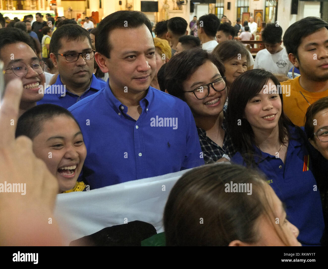 Senator Antonio Trillanes IV seen posing for a group picture with his supporters during the campaign. The Opposition Senatorial candidates, known as 'Otso Diretso' (means vote straight the 8 senatorial bets) kicked off their campaigns in Caloocan City. The Senatorial slate composed of experienced but relatively unknown opposition bets appeal to voting population that still supports the ruling Duterte Administration. Stock Photo