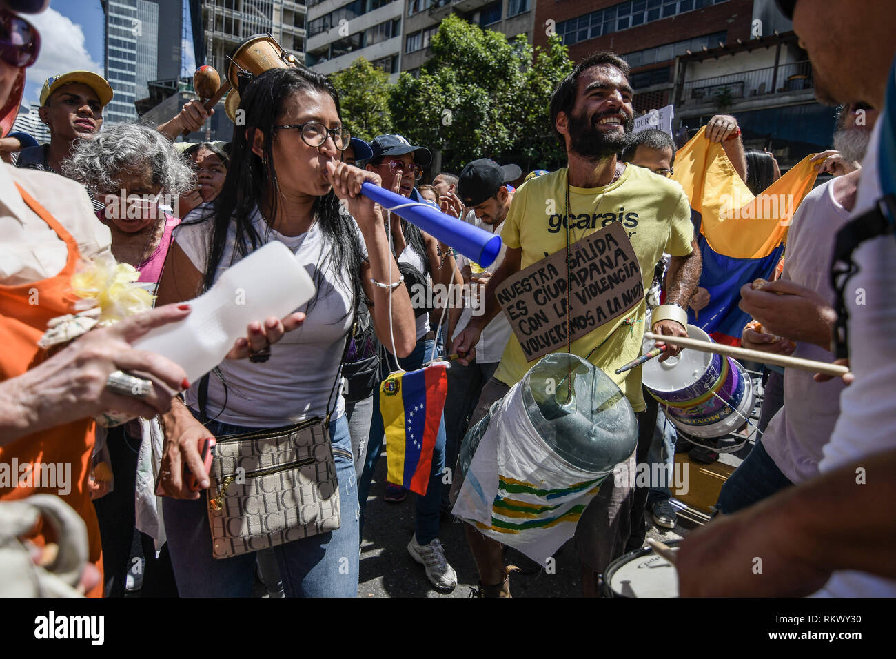 Caracas, Miranda, Venezuela. 12th Feb, 2019. Musicians seen performing during a protest to call for a change in the government.Opponents gather at a protest organised by the PSUV (United Socialist Party of Venezuela) after the call from interim president Juan Guaido, to show their support to him, while asking the army to allow more humanitarian aids into the country. Credit: Roman Camacho/SOPA Images/ZUMA Wire/Alamy Live News Stock Photo