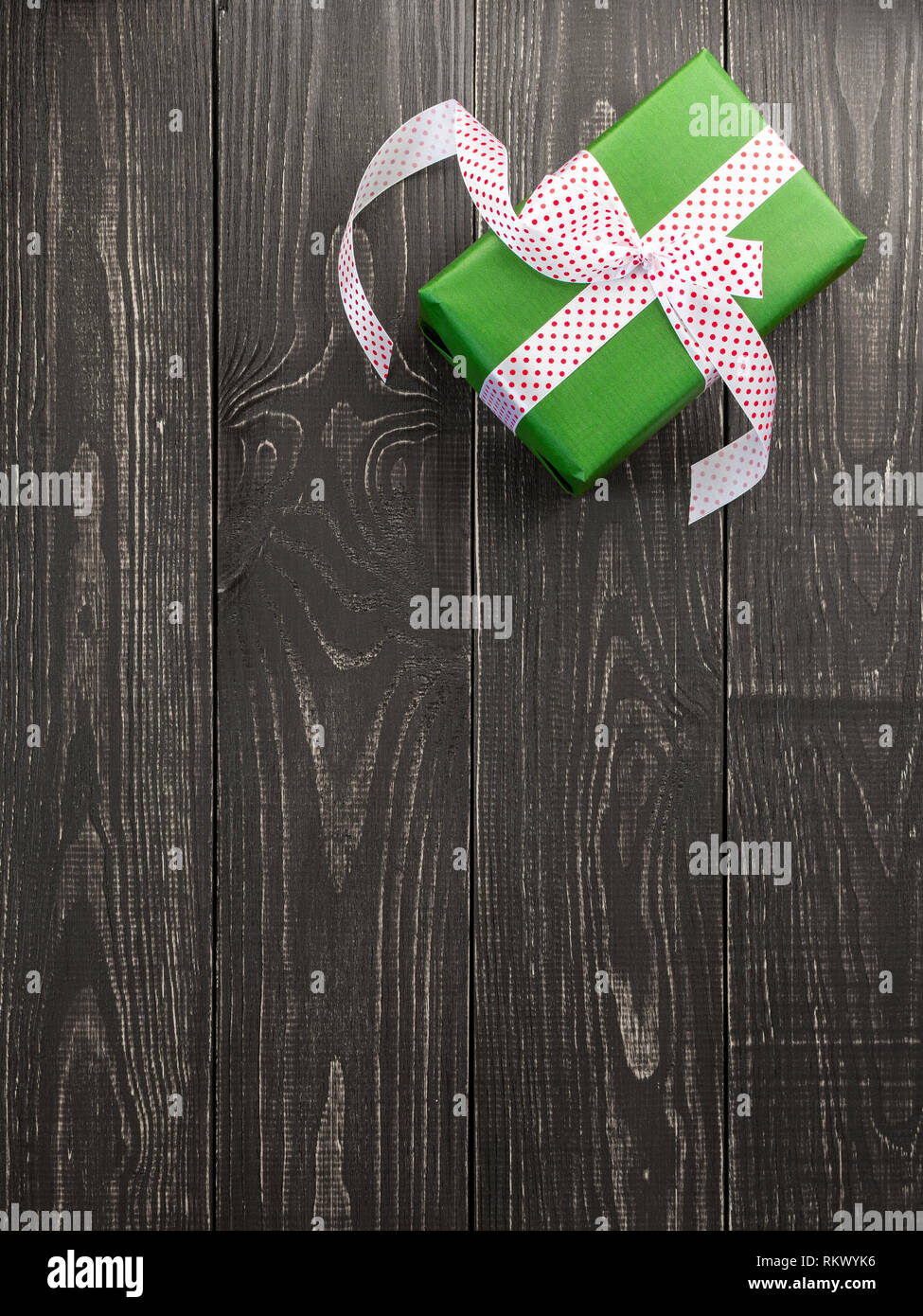 Festive Background Vertical Banner With Green Gift Box And Ribbon