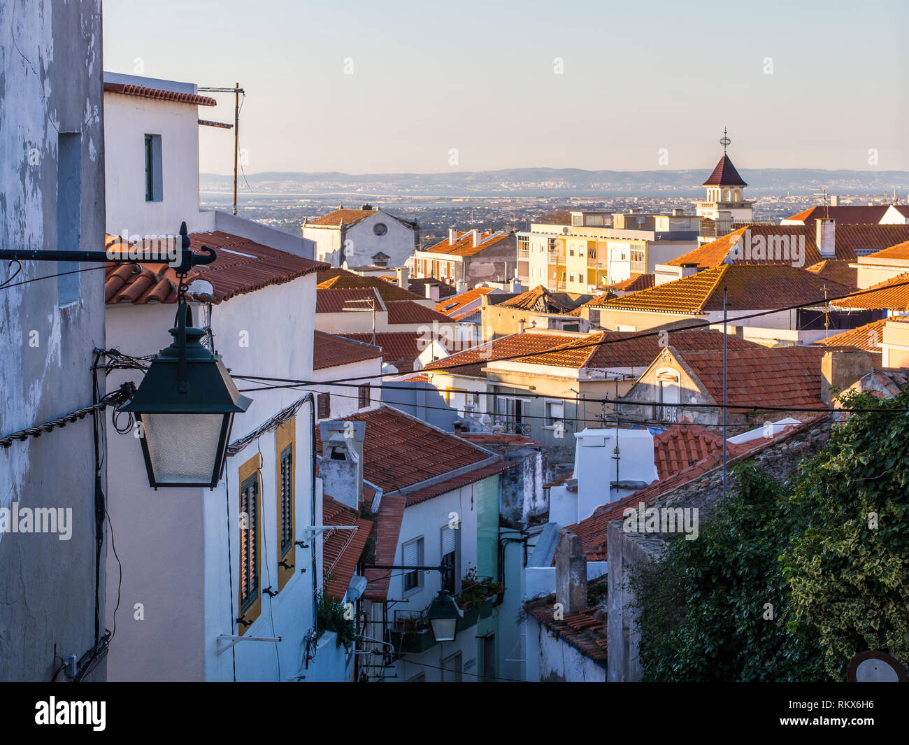 Street in the Old Town in Palmela, Setubal District, south of Lisbon in Portugal, at sunset. Stock Photo