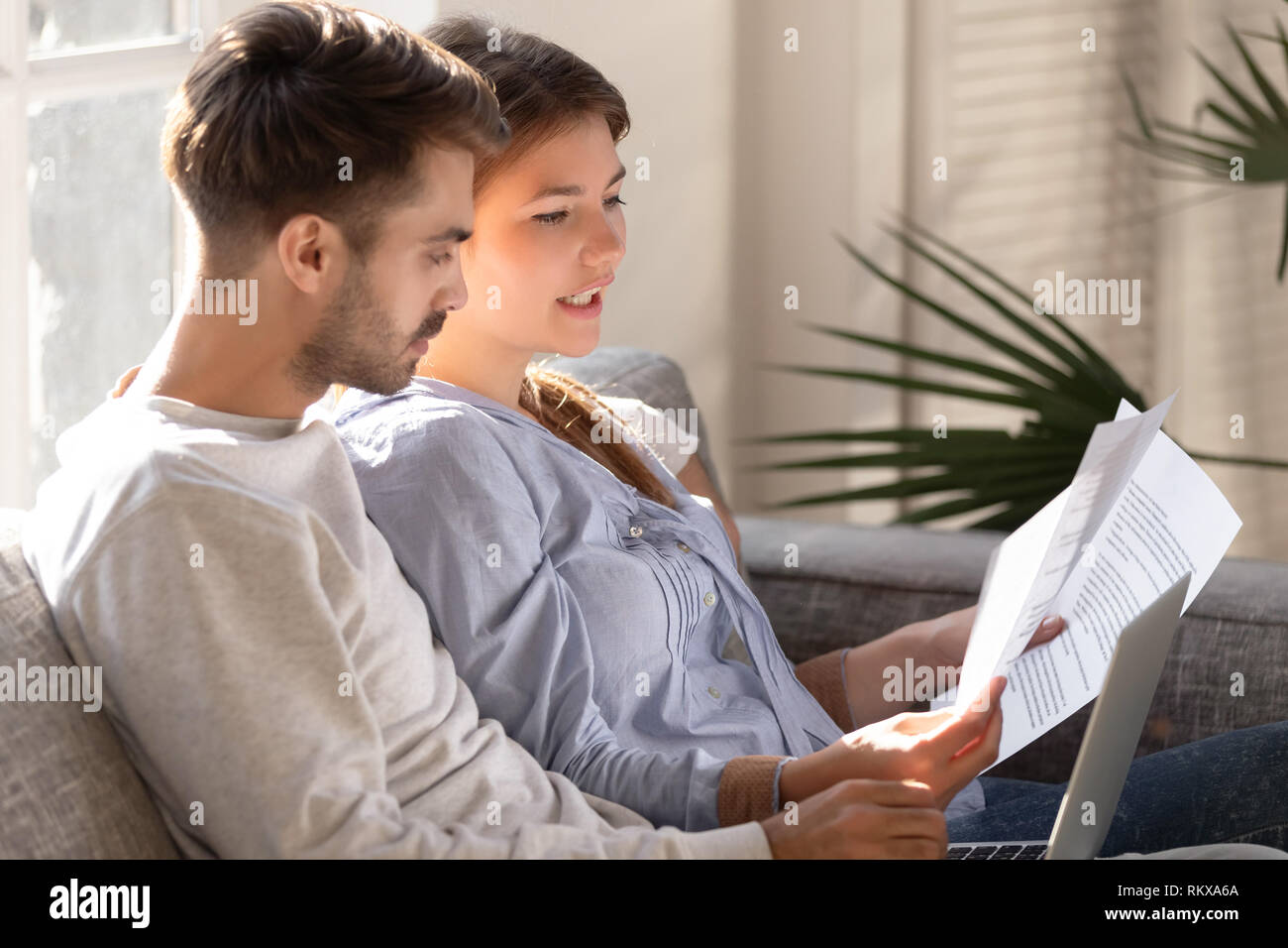 Female marketing manager talking to client presenting new project plan Stock Photo
