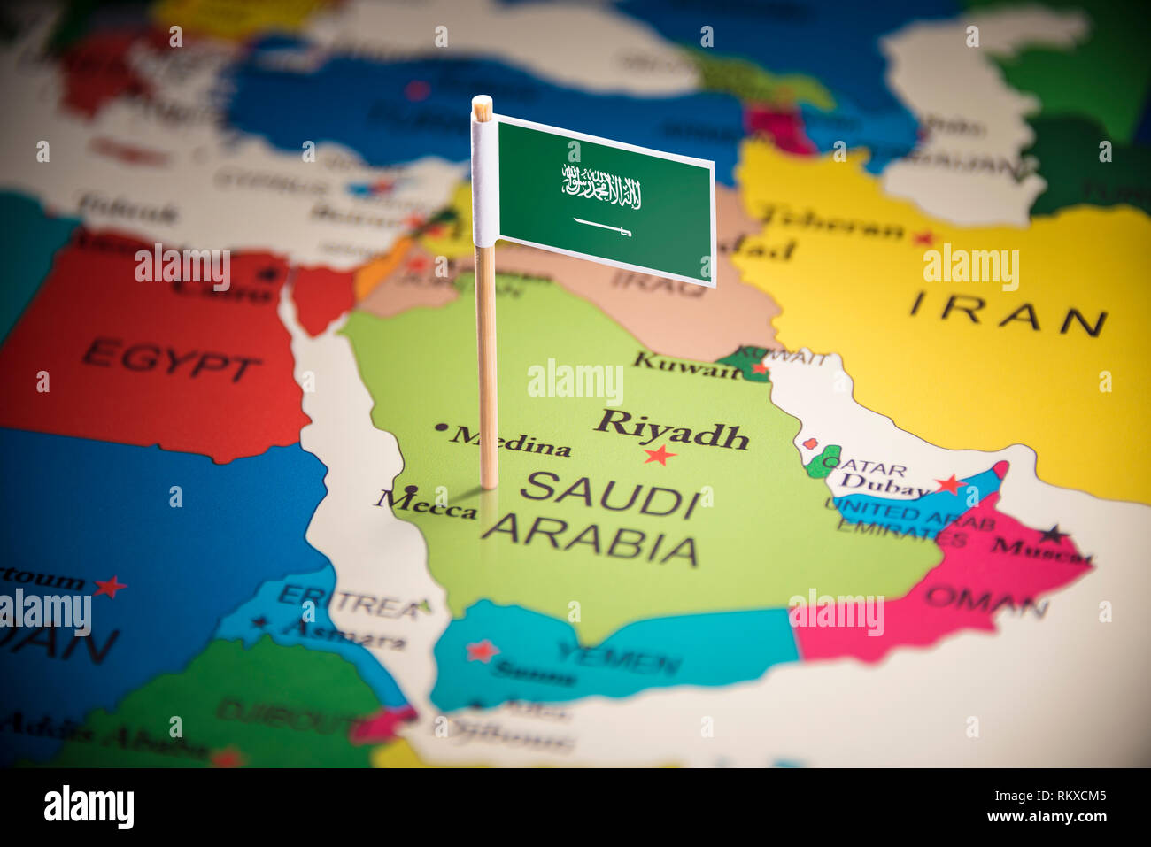 Saudi Arabia marked with a flag on the map Stock Photo