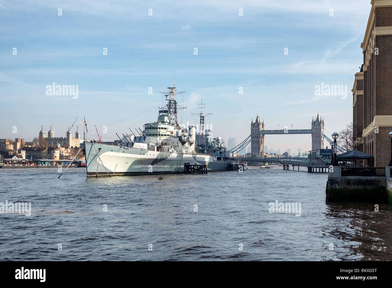 HMS Belfast is a Town-class light cruiser that was built for the Royal Navy.  She is moored on the River Thames, London, England as a museum ship. Stock Photo