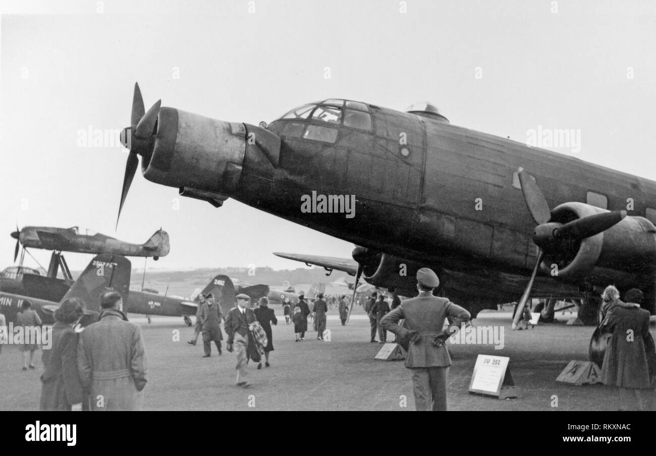 Captured German Luftwaffe and Italian Air Force aircraft being displayed at a Captured Aircraft Exhibition in Farnborough, England, in 1945. Main aircraft is a German Luftwaffe Ju352. Stock Photo