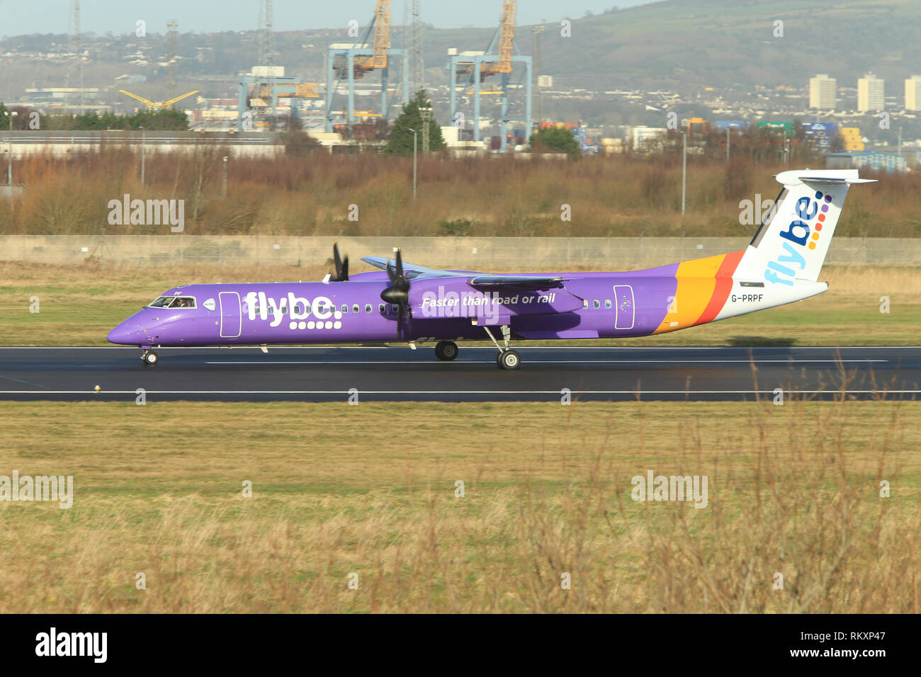 Flybe Aircraft arrive and depart from George Best Belfast City Airport in Belfast, Northern Ireland. Stock Photo