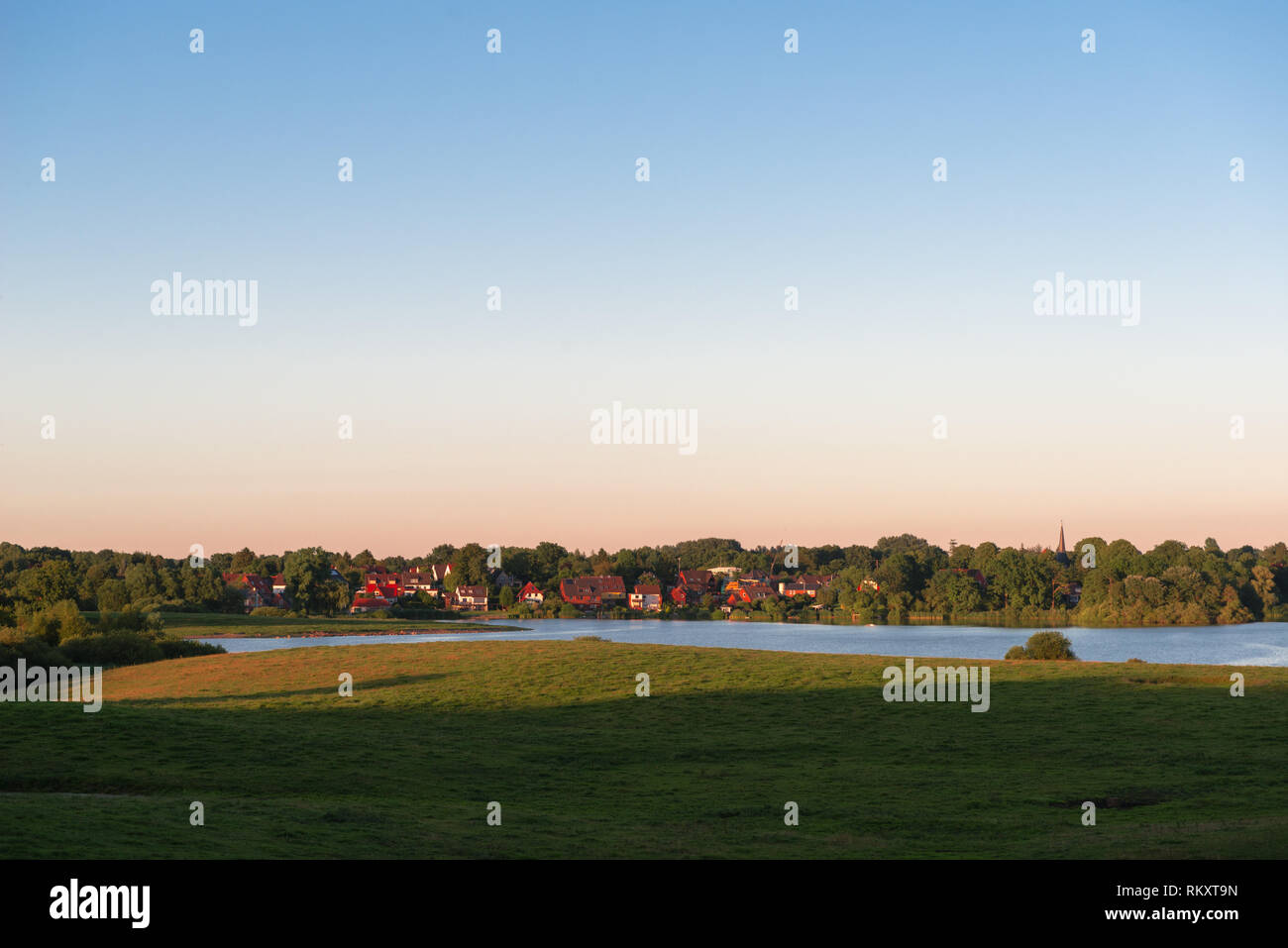 Viewing the village of Kirchbarkau on Lake Bothkamp from the western shore, Rendsburg, Eckernförde, Schleswig-Holstein, Germany, Europe Stock Photo