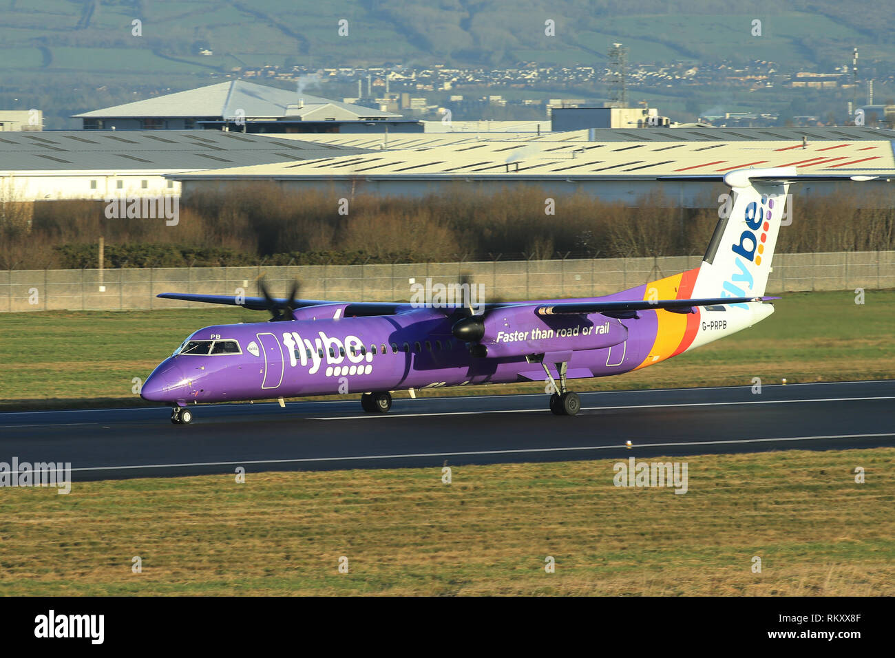 Bombardier Dash 8 Q400 Flybe Aircraft arrive and depart from George Best Belfast City Airport in Belfast, Northern Ireland. Stock Photo