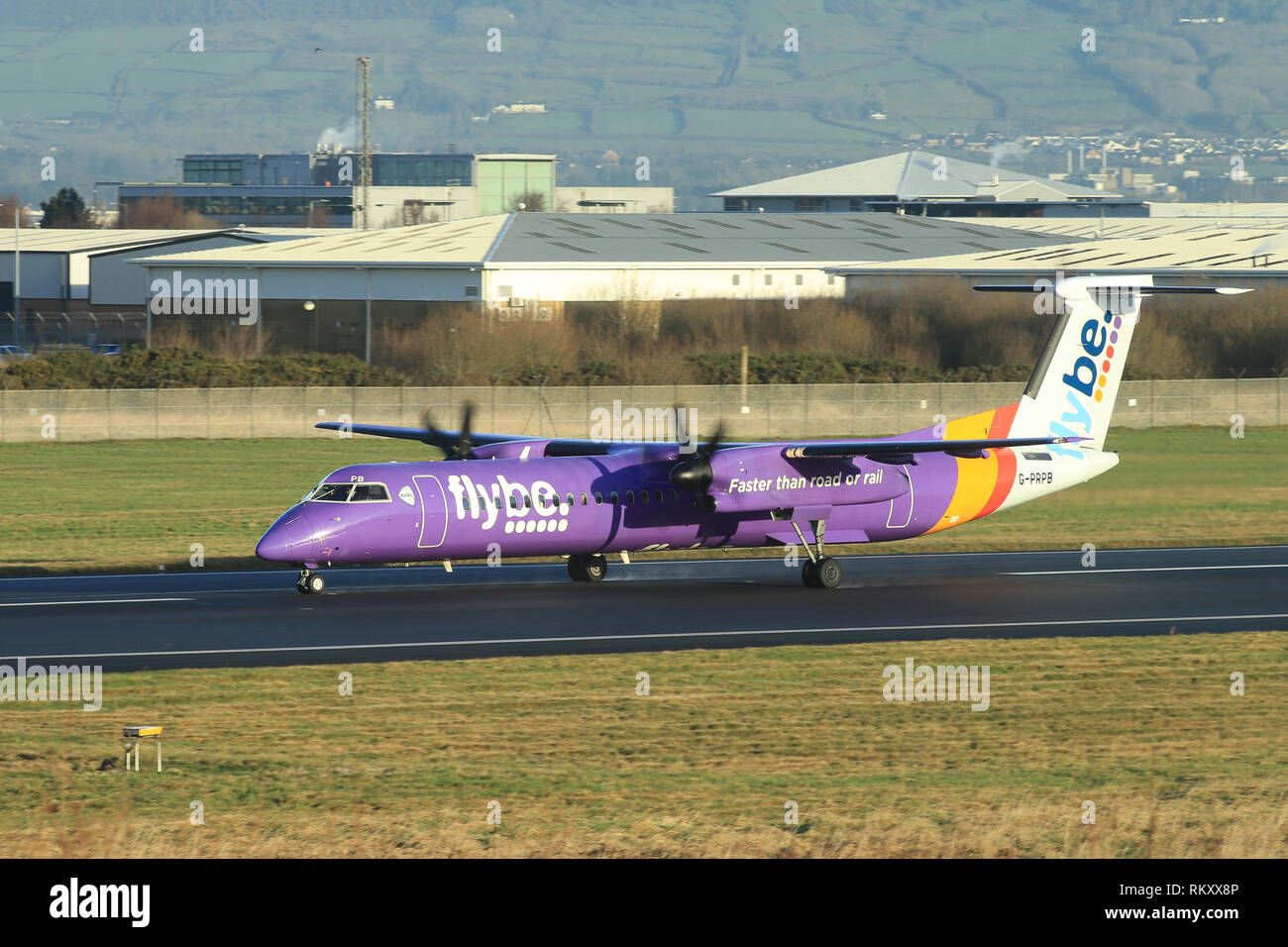 Bombardier Dash 8 Q400 Flybe Aircraft arrive and depart from George Best Belfast City Airport in Belfast, Northern Ireland. Stock Photo
