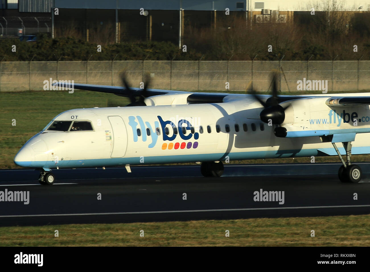 Flybe Q400 wearing the old livery. Flybe Aircraft arrive and depart from George Best Belfast City Airport in Belfast, Northern Ireland. Stock Photo