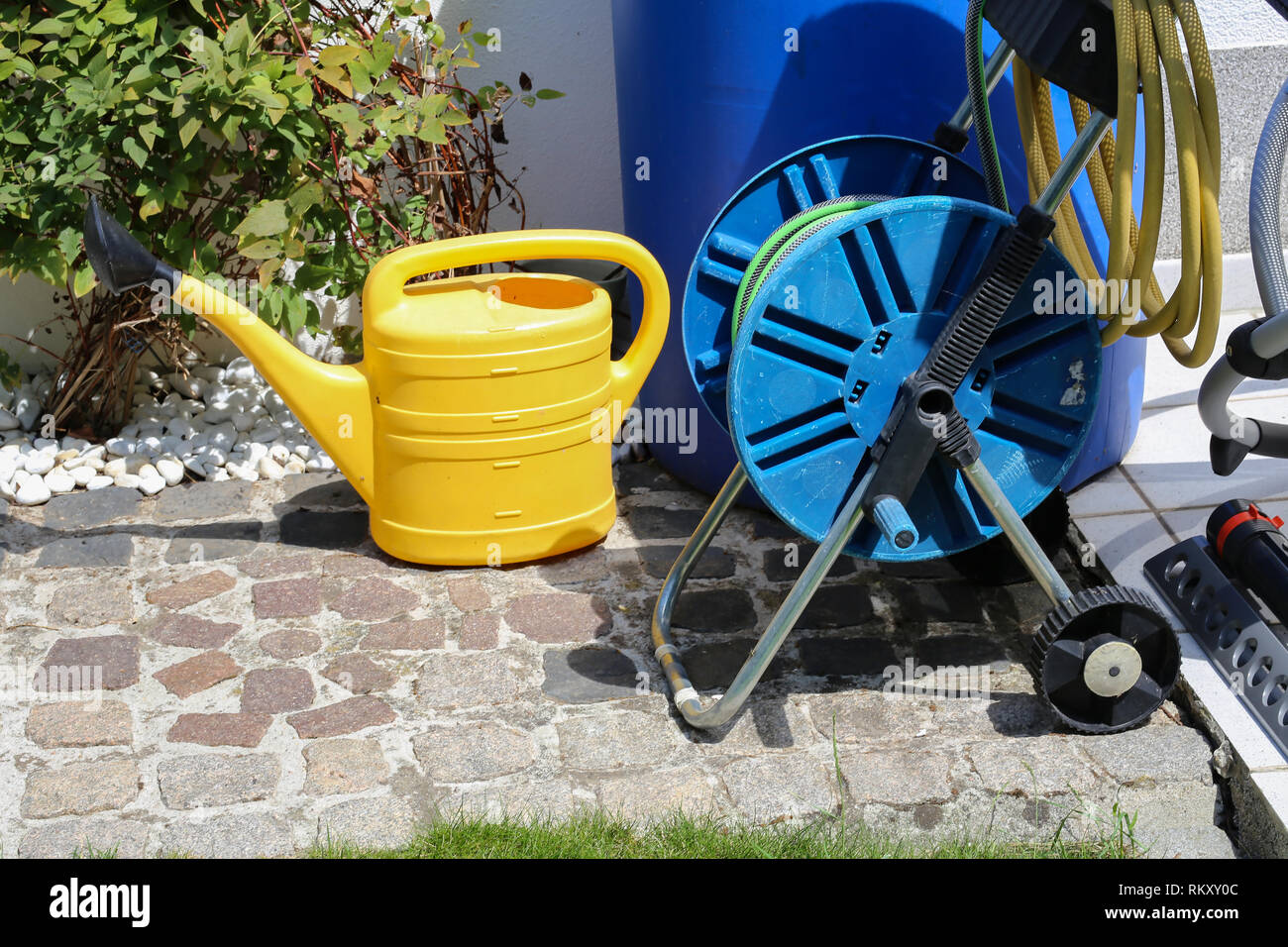 Garden tool / Watering tools in the garden Stock Photo Alamy