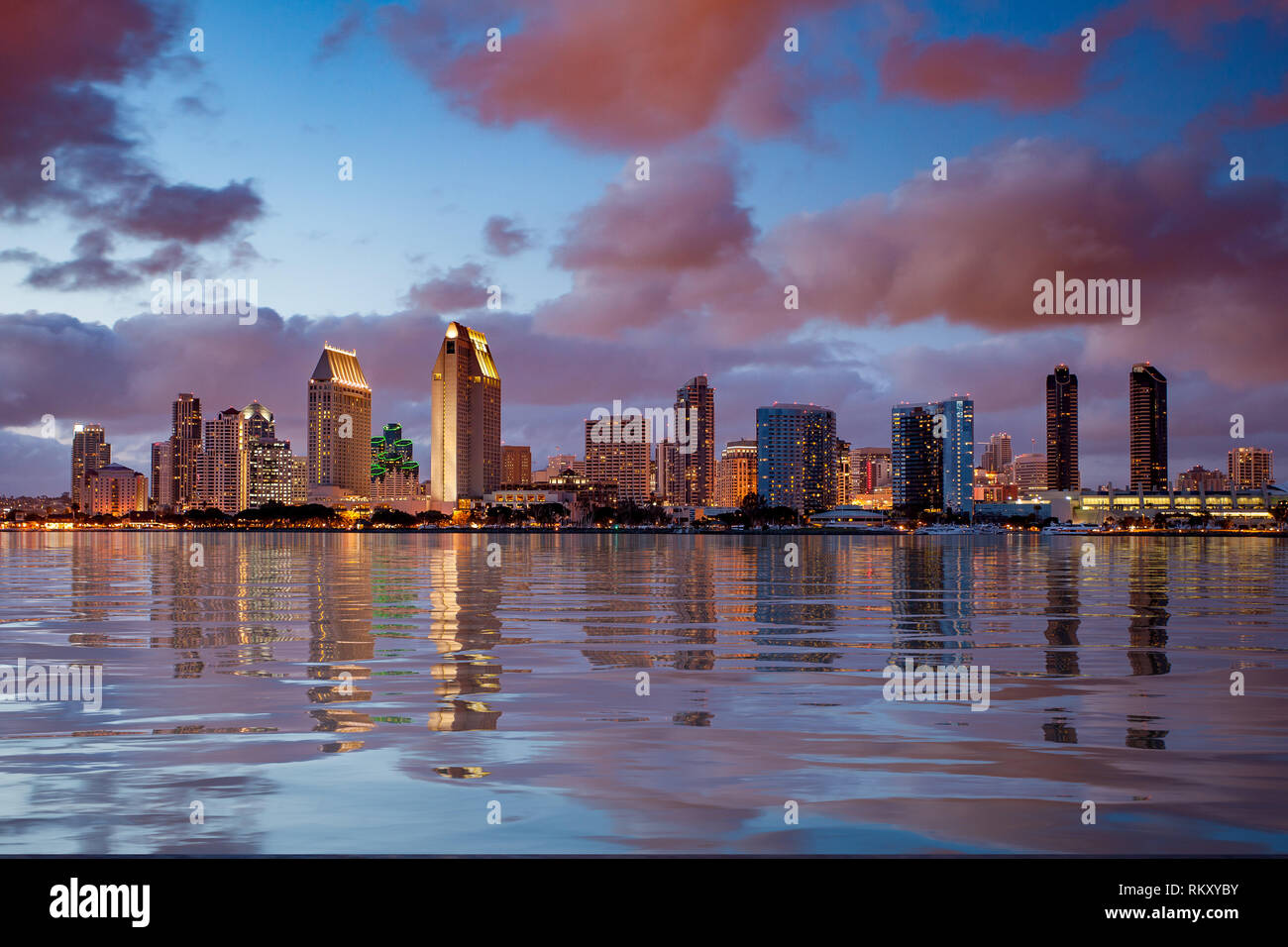 San Diego skyline at dusk reflected in an artificial water surface showing the cityscape Stock Photo