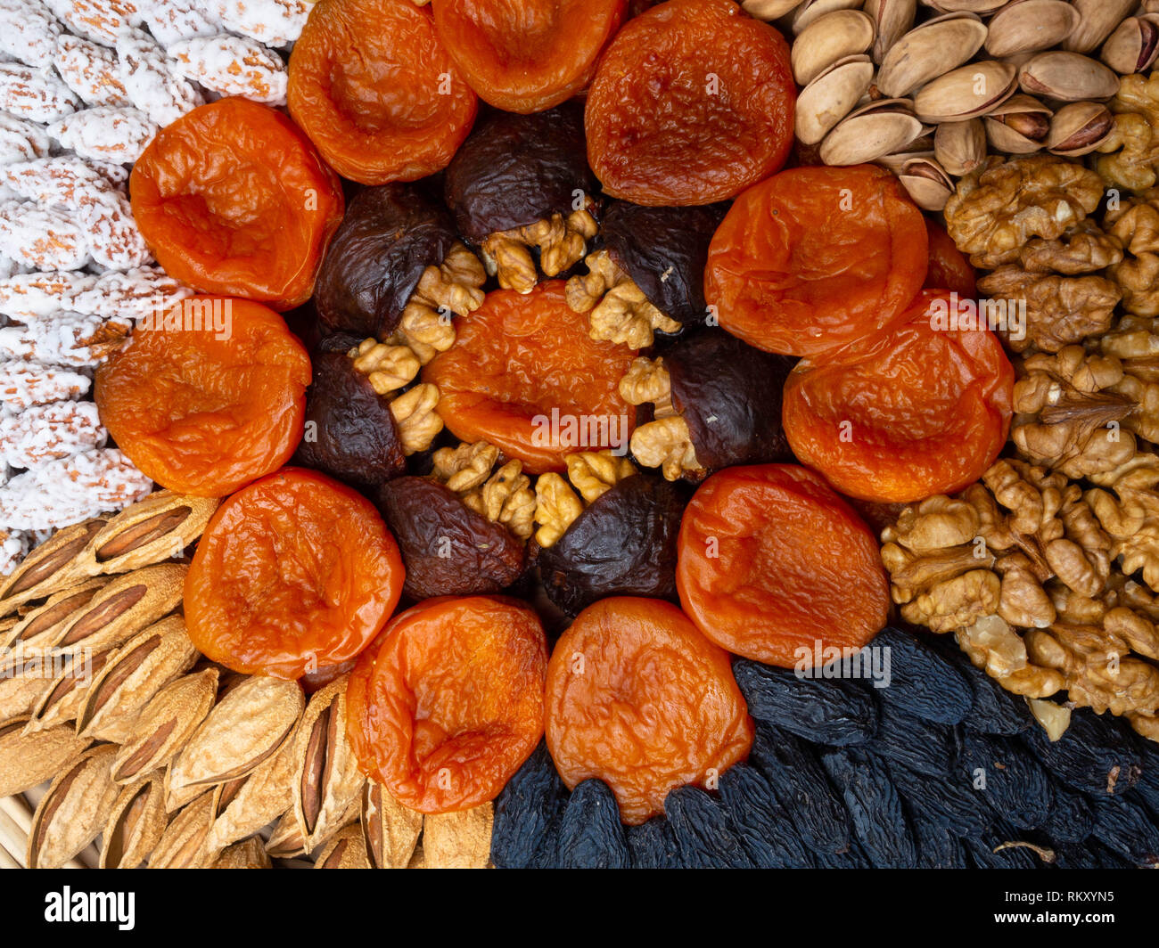 Dried apricots raisin and nuts , round composition. Circle divided into