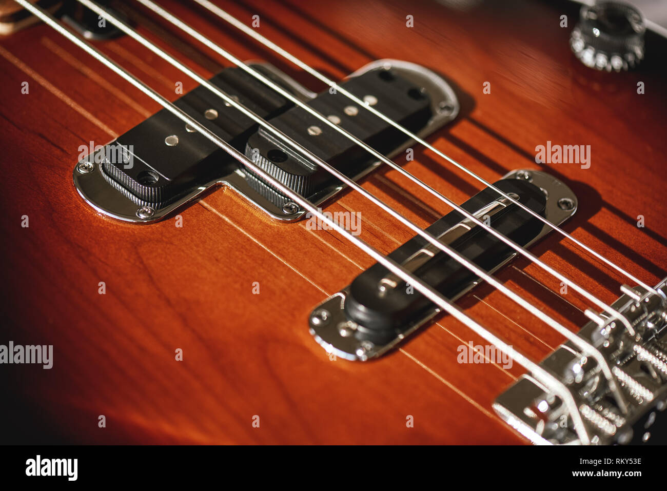 Guitar body. Closeup view of electric guitar body with metal strings
