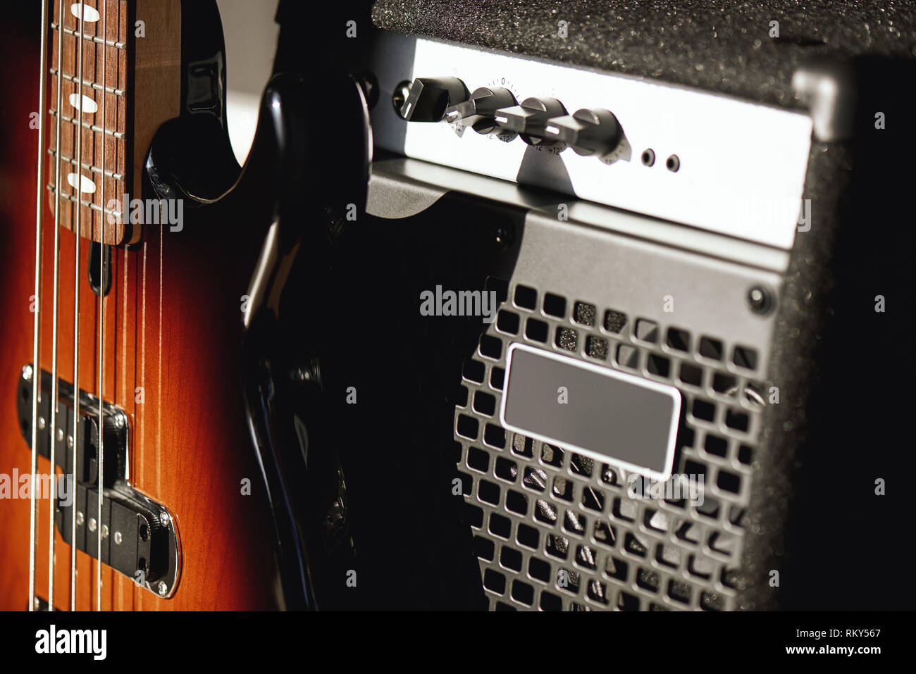 Beautiful and perfect polished electric guitar with amplifier standing