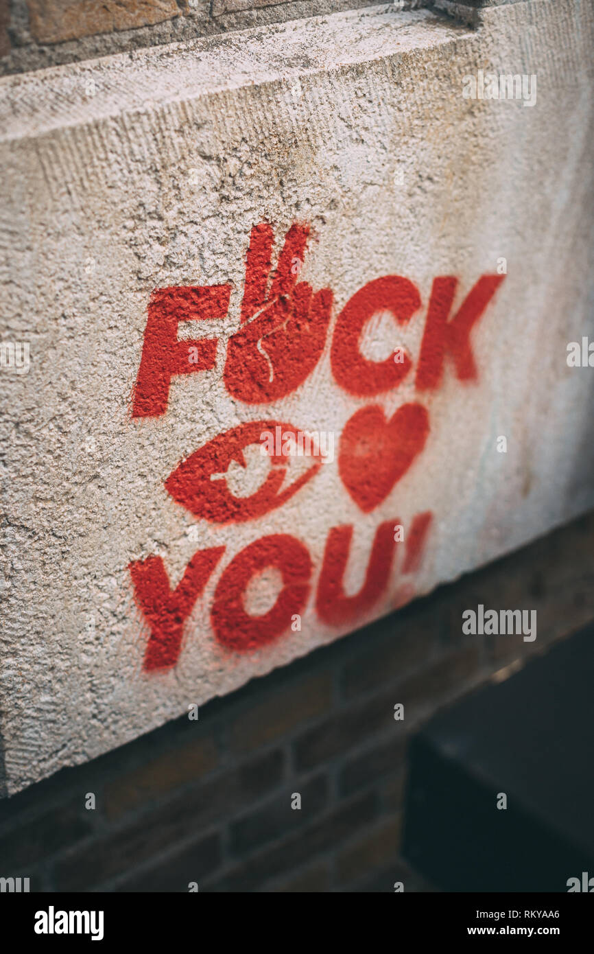 A bold but loving graffiti message. Stock Photo
