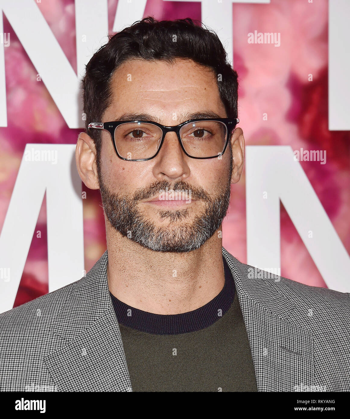 LOS ANGELES, CA - FEBRUARY 11: Tom Ellis arrives at the Premiere Of Warner Bros. Pictures' 'Isn't It Romantic' at The Theatre at Ace Hotel on February Stock Photo